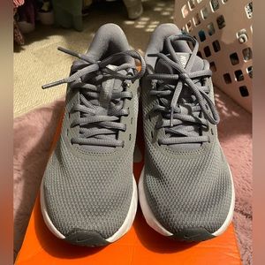 Womens grey Nike Revolution running shoes
